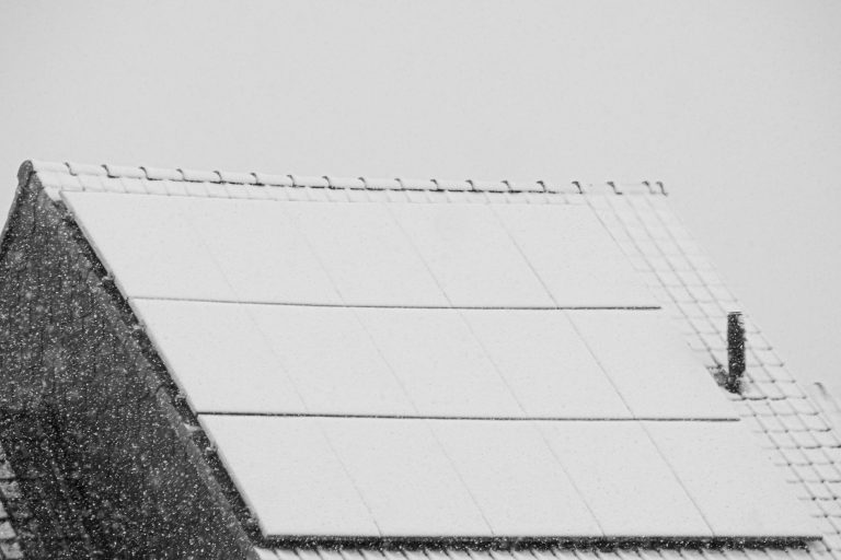 roof solar panels covered in snow